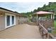 Spacious backyard featuring a large wood deck and a gazebo at 113 Gulf Drive Dr, Dunn, NC 28334
