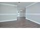 Open dining room with hardwood floors, white trim and neutral walls at 113 Gulf Drive Dr, Dunn, NC 28334