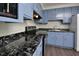 Well-lit kitchen featuring stylish countertops and stainless steel appliances at 113 Gulf Drive Dr, Dunn, NC 28334