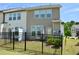 Charming backyard with fenced lawn, patio furniture and an attractive fence at 1141 Amber Shadow Dr # 101, Durham, NC 27703