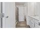 Bright, modern bathroom with double vanity, glass enclosed shower, and luxury finishes at 1141 Amber Shadow Dr # 101, Durham, NC 27703