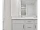 Bright bathroom with white cabinets, double vanity, and quartz countertops at 1141 Amber Shadow Dr # 101, Durham, NC 27703