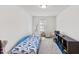 bedroom features a playful tent, cozy armchair, and blue car-shaped bed for a fun, imaginative space at 1141 Amber Shadow Dr # 101, Durham, NC 27703