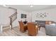 Open-concept living space with stairs and access to the upstairs at 1141 Amber Shadow Dr # 101, Durham, NC 27703