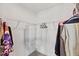 Organized walk-in closet with ample shelving and hanging space at 1141 Amber Shadow Dr # 101, Durham, NC 27703