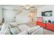 Spacious bonus room with carpet, a comfortable sectional, and lots of space for activities at 115 Bourne Dr, Franklinton, NC 27525