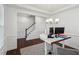 A minimalist home office featuring white trim and views of a staircase at 115 Bourne Dr, Franklinton, NC 27525