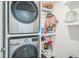 Laundry room featuring stacked washer and dryer and shelving for storage at 115 Bourne Dr, Franklinton, NC 27525