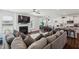 Spacious living area featuring a fireplace, open layout, modern decor, and plenty of seating at 115 Bourne Dr, Franklinton, NC 27525