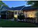 Outdoor living space with a pergola, patio, fire pit, and screened-in porch at 115 Oak Leaf Trl, Youngsville, NC 27596