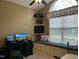Bedroom showcasing a window seat, desk area, and cozy natural lighting at 115 Oak Leaf Trl, Youngsville, NC 27596
