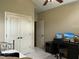 Bedroom boasts a closet, desk setup, and comfortable ambiance at 115 Oak Leaf Trl, Youngsville, NC 27596