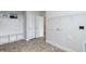 Laundry room features vinyl flooring, a coat rack, and washer/dryer hookups at 115 River Chapel Dr, Fuquay Varina, NC 27526
