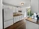 Functional kitchen with modern appliances, ample cabinet space, and wood flooring at 122 Mallard Ct, Chapel Hill, NC 27517