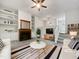 Inviting living room with a fireplace, built-in shelves, and a stylish striped rug at 122 Mallard Ct, Chapel Hill, NC 27517