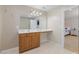 Bathroom vanity with mirror, adjacent to doorway that views bedroom at 1220 Marbank St, Wake Forest, NC 27587