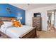Cozy bedroom featuring stylish decor, modern furnishings, and a ceiling fan at 1220 Marbank St, Wake Forest, NC 27587