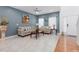 Inviting living area with modern decor and plenty of natural light at 1220 Marbank St, Wake Forest, NC 27587