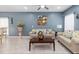 Cozy living room with a comfortable seating arrangement and stylish decor at 1220 Marbank St, Wake Forest, NC 27587