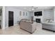 Inviting living room with a fireplace, tile floors, and neutral decor, perfect for relaxation and entertaining at 1220 Marbank St, Wake Forest, NC 27587