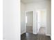 Hallway with hardwood flooring, view of rooms with carpet and natural light at 1234 Pioneer Lot 3 Dr, Sanford, NC 27330