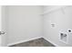 Laundry room with tile flooring, open storage shelf and utility connections at 1234 Pioneer Lot 3 Dr, Sanford, NC 27330