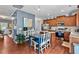 Modern kitchen featuring a center island, stainless steel appliances, and seamless access to the dining area at 1287 Salters St, Burlington, NC 27215