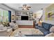 Cozy living room with built-in shelving, plush seating, and ample natural light for a relaxing atmosphere at 1287 Salters St, Burlington, NC 27215