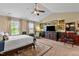 This main bedroom is carpeted, and has multiple windows for bright, natural light at 1287 Salters St, Burlington, NC 27215
