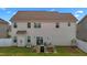 Beautiful backyard featuring a well-maintained lawn, patio, and great space for entertaining at 135 Campaign Dr, Mebane, NC 27302