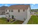 Exterior view of the backyard, patio, with plenty of space for hosting and entertaining at 135 Campaign Dr, Mebane, NC 27302