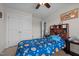Bright bedroom features a fun space themed bed set and a built in bookcase headboard at 135 Campaign Dr, Mebane, NC 27302