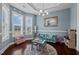 Bright playroom with a round rug, large windows, and playful décor, perfect for activities at 135 Campaign Dr, Mebane, NC 27302