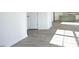 Open-concept living room and kitchen, with hardwood floors throughout at 139 Palm Drive Dr, Sanford, NC 27332