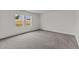 Bedroom with neutral carpet and paint has natural light at 141 Gladstone Loop, Clayton, NC 27520