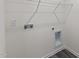 The laundry room features all connections for both washer and dryer at 141 Gladstone Loop, Clayton, NC 27520