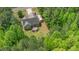 Aerial view of a house with an RV, deck, and wooded surroundings at 175 Grist Mill Dr, Franklinton, NC 27525