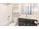 Clean and bright bathroom features a tub/shower combination and vanity with storage at 175 Grist Mill Dr, Franklinton, NC 27525