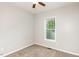 Bedroom with a ceiling fan and a window offering ample natural light at 175 Grist Mill Dr, Franklinton, NC 27525