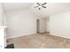 A well-lit living room showing neutral paint, carpet flooring, fireplace, and open layout at 175 Grist Mill Dr, Franklinton, NC 27525