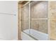 Bathroom featuring a tiled shower over tub with glass doors at 1925 W Lake Dr, Burlington, NC 27215
