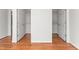Spacious and closets, with a view of dark hardwood floors at 1925 W Lake Dr, Burlington, NC 27215