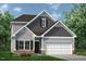 Charming two-story home features a two car garage, gray siding and stone accents at 202 E Victory View Ter, Smithfield, NC 27577