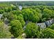Aerial view of the homes and lake at 206 Swiss Lake Dr, Cary, NC 27513