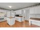 Functional kitchen featuring island, lots of storage, and breakfast nook at 206 Swiss Lake Dr, Cary, NC 27513