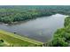 Aerial view of the lake and dam at 206 Swiss Lake Dr, Cary, NC 27513