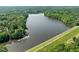 Scenic aerial view of lake with dock at 206 Swiss Lake Dr, Cary, NC 27513