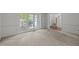 Bright living room featuring large windows offering ample natural light at 206 Swiss Lake Dr, Cary, NC 27513