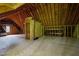 Large, unfinished attic space with exposed beams and insulation at 213 Old Franklin Grove Dr, Chapel Hill, NC 27514