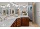 Elegant bathroom features double sinks, a large mirror, and bright lighting at 213 Old Franklin Grove Dr, Chapel Hill, NC 27514